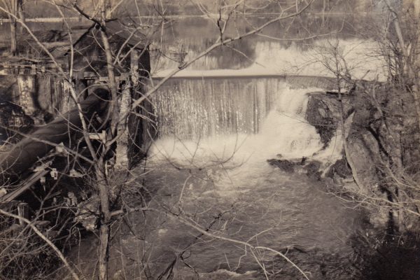Smart's Pond dam on the Wynantskill Creek in Troy, behind the present Cumberland Farms on Campbell Ave., taken by Fred Backhaus in 1948.  Note the pipeline and gatehouse on left side for the hydroelectric plant that was down the hill at Burden Pond.  The hydroelectric plant provided power to the Albia Paper and Box plant a couple of miles away on Pawling Ave. near Winter St. from 1905 to 1955.  Part of the right side of the dam was breached many years ago, and what was left standing was knocked down by the Hurricane Irene flooding.
